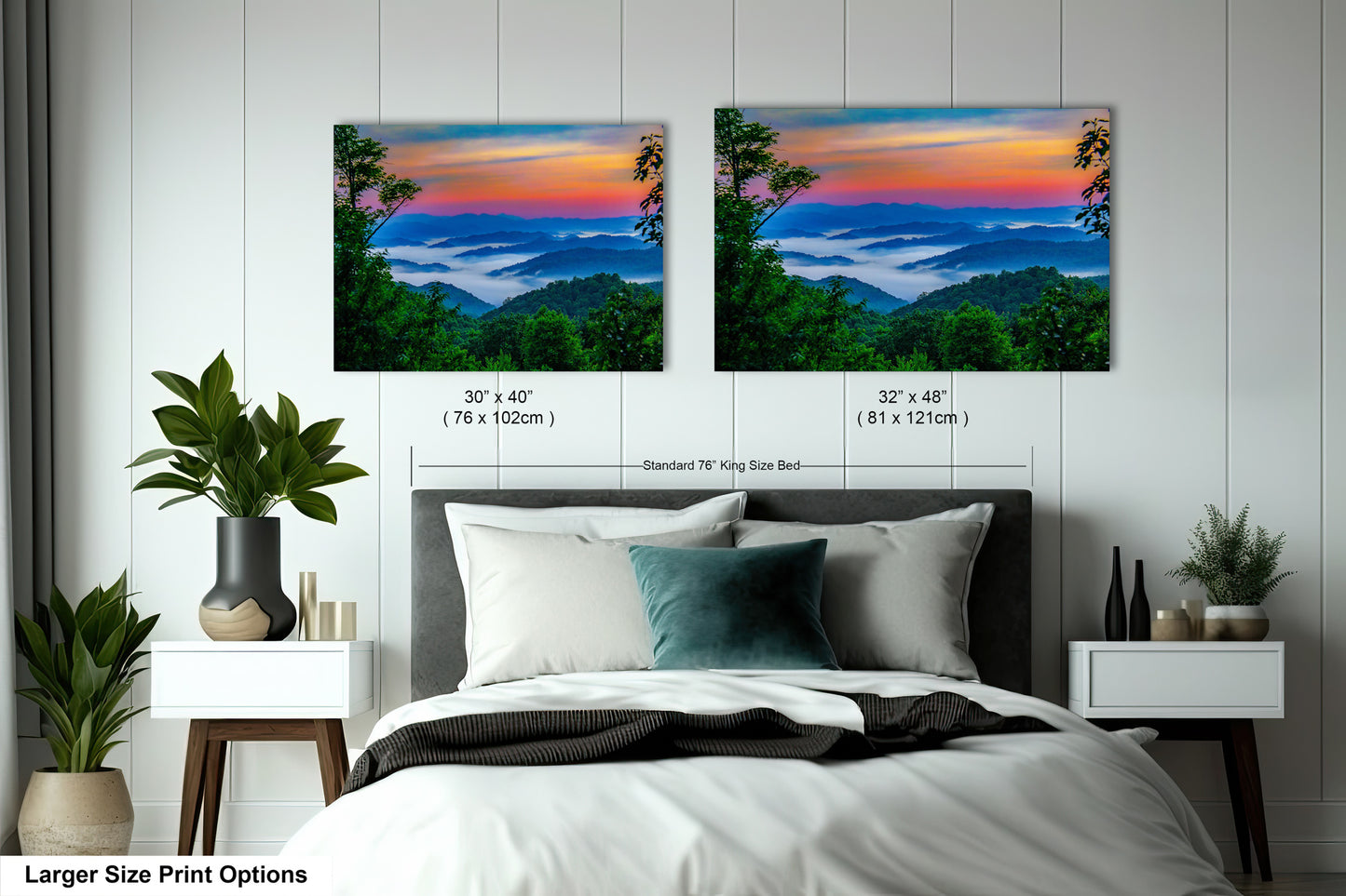 a bedroom with a bed and two paintings on the wall
