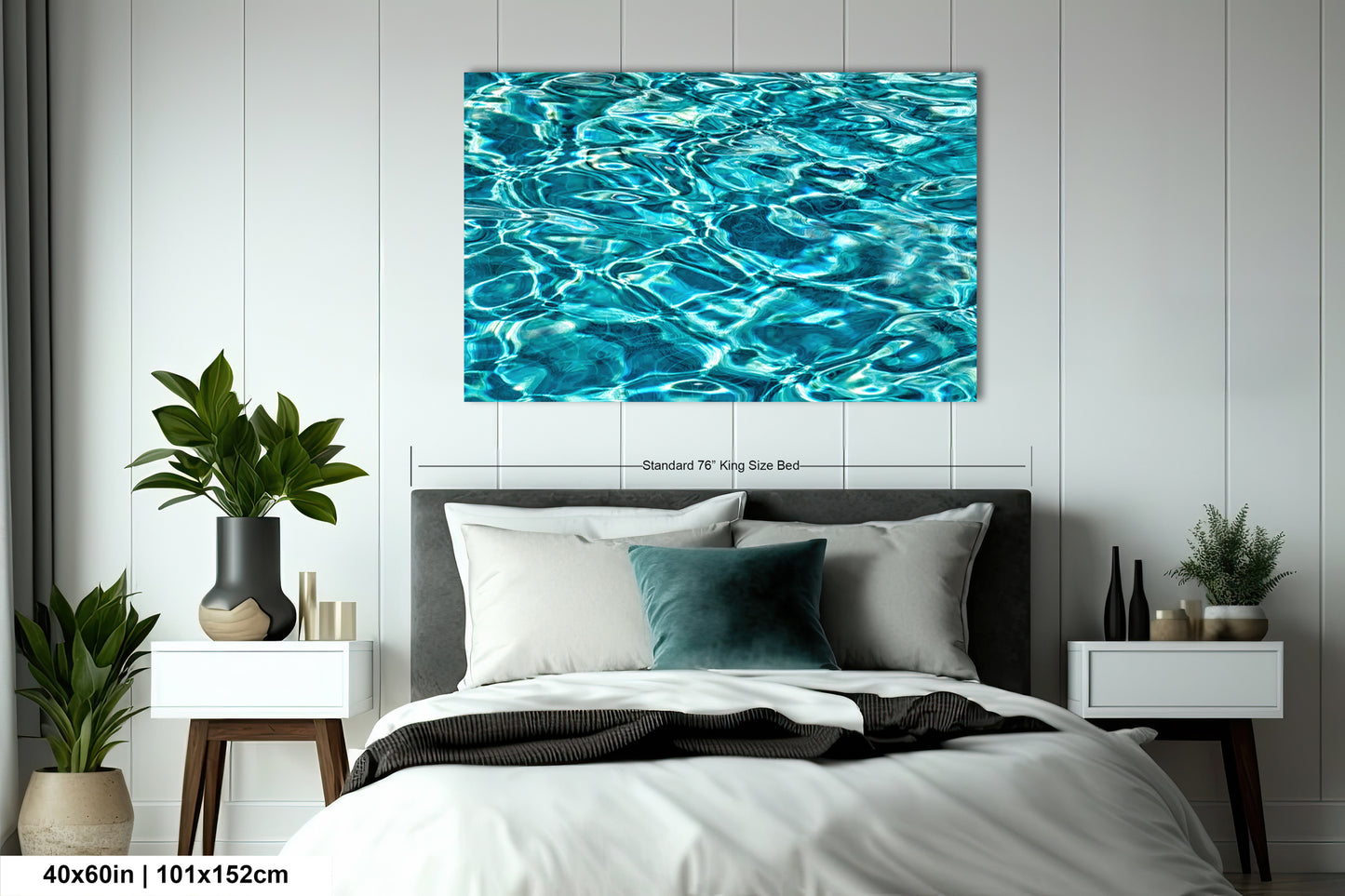 a bedroom with a large bed, nightstands, and a painting of water on the wall.