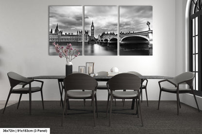 a black and white photo of a dining room table