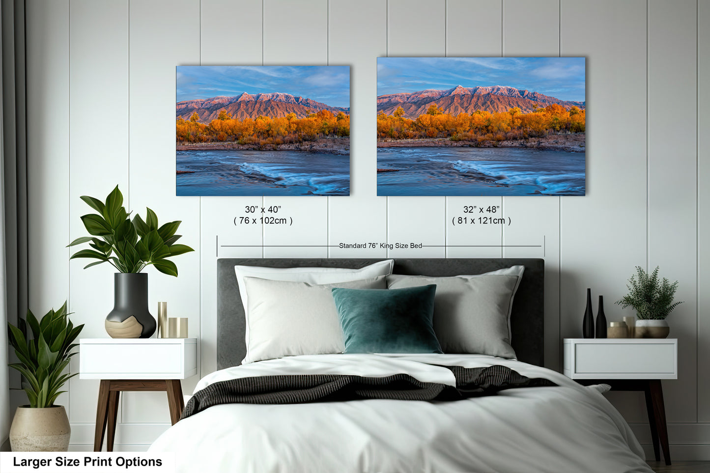 a bedroom with a bed and two pictures on the wall