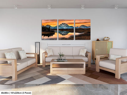 a living room filled with furniture and a painting on the wall