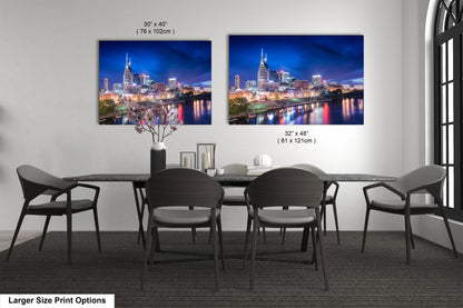 a dining room table with chairs and a picture of a city