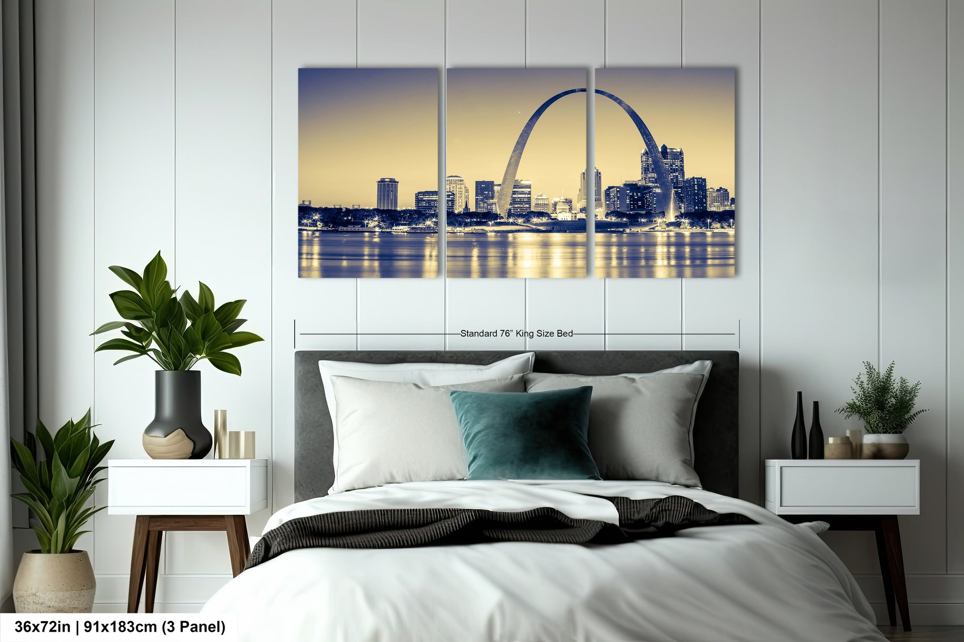 a bedroom with a large bed and a picture of the gateway arch