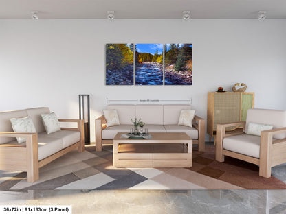 a living room filled with furniture and a painting on the wall