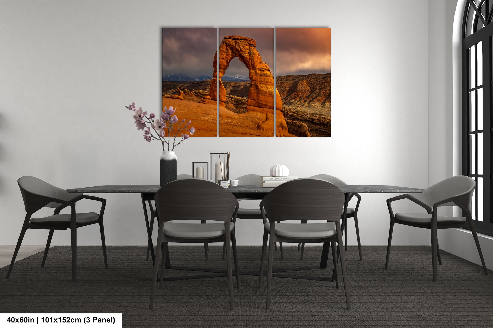 a dining room with a table and chairs
