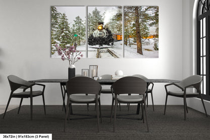 a dining room table with chairs and a painting on the wall