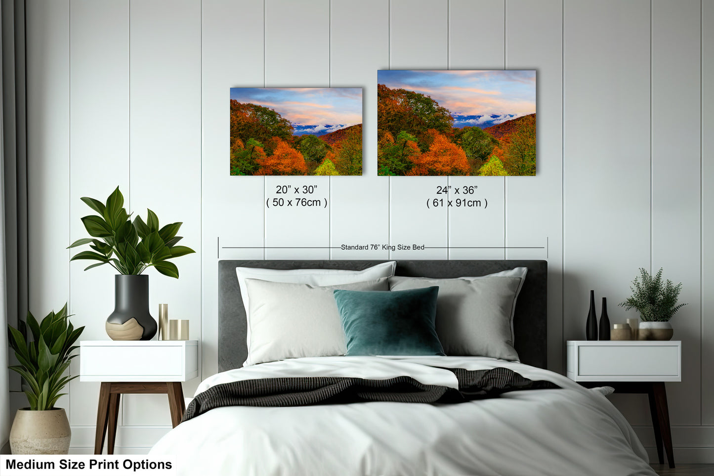 a bedroom with a bed and two pictures on the wall