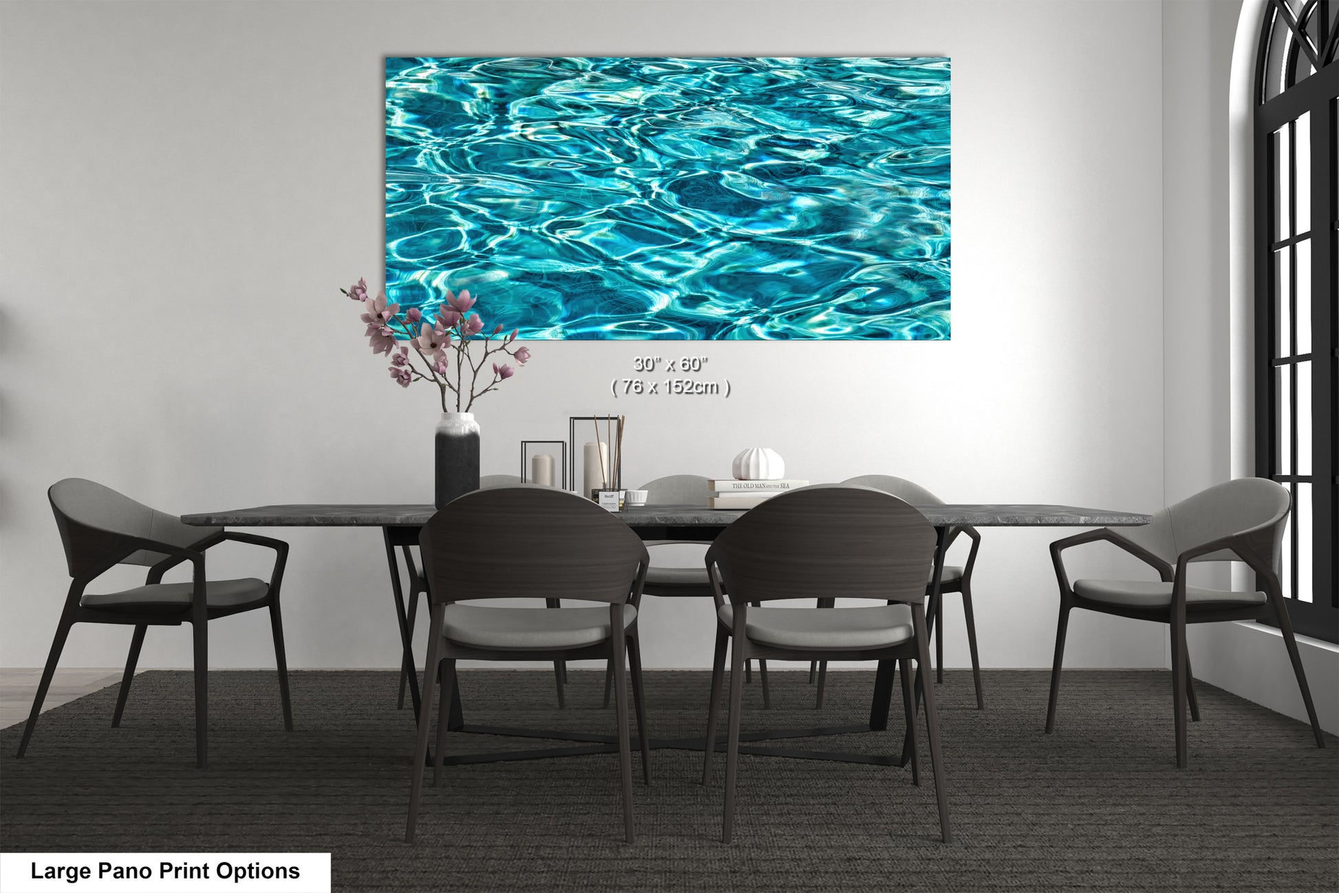 A modern dining room with a large abstract painting of water on the wall above a black table surrounded by six chairs.