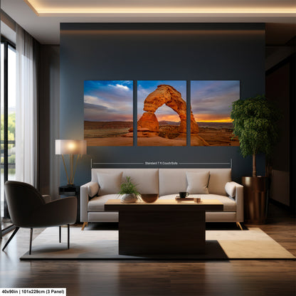 a living room filled with furniture and a painting on the wall