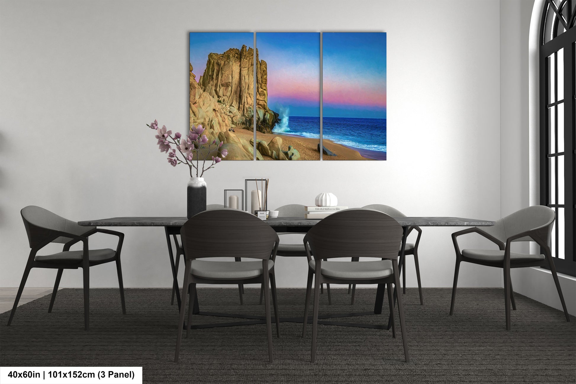 a dining room table with chairs and a painting on the wall