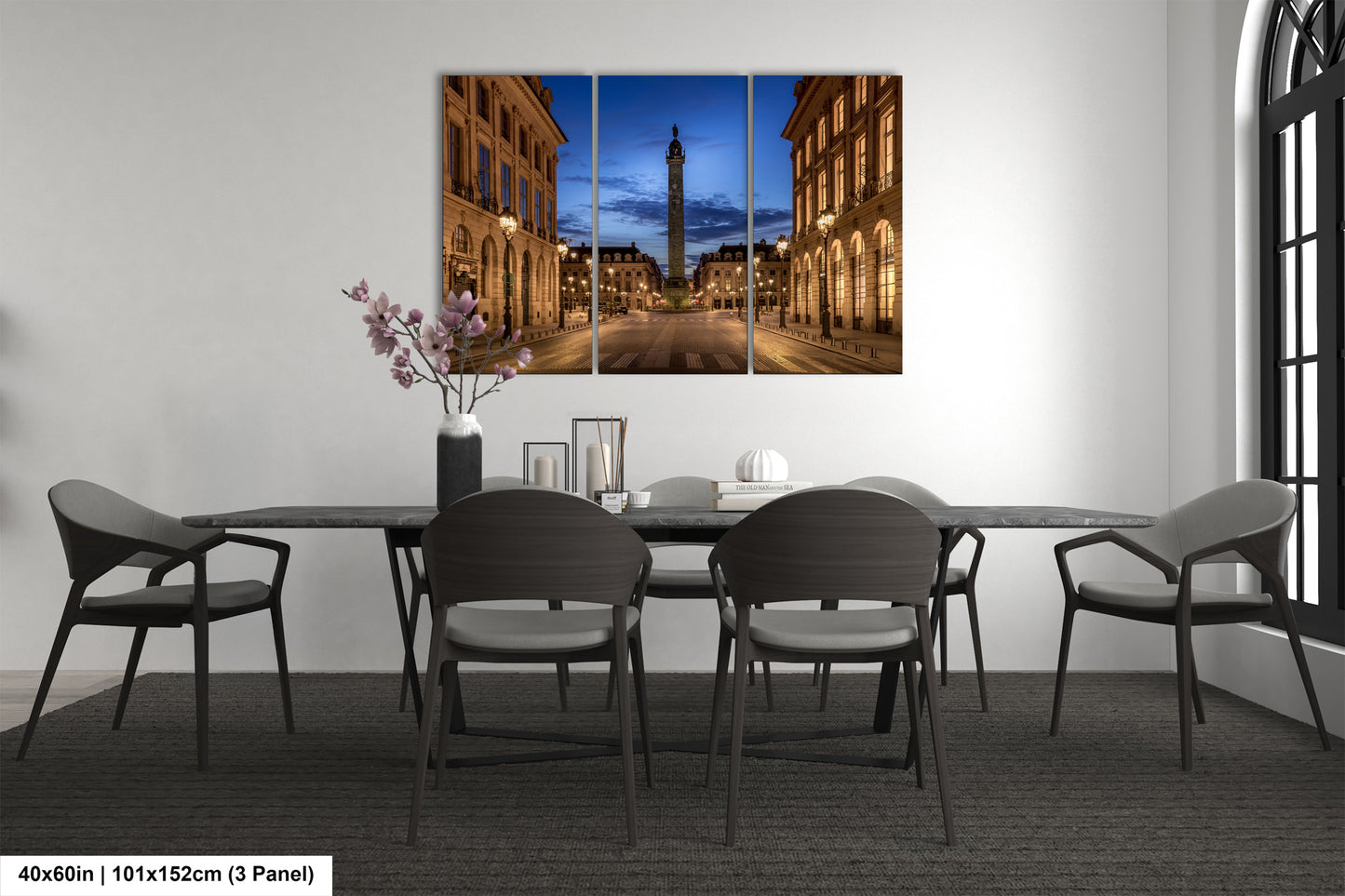 a dining room with a table and chairs