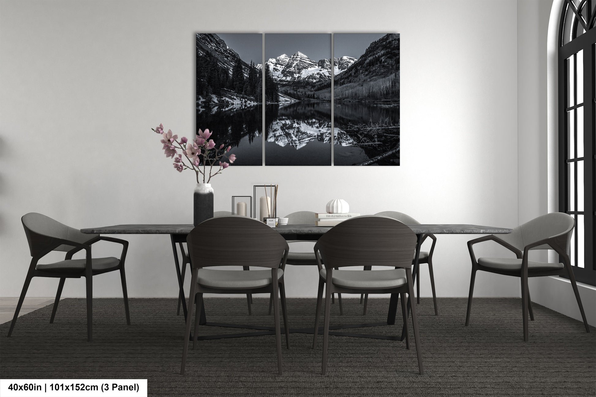 a dining room with a table and chairs