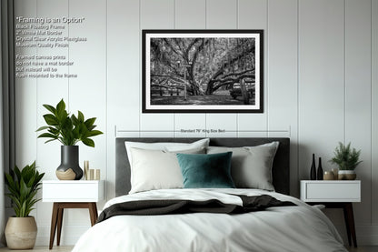 a black and white photo of a bed in a bedroom