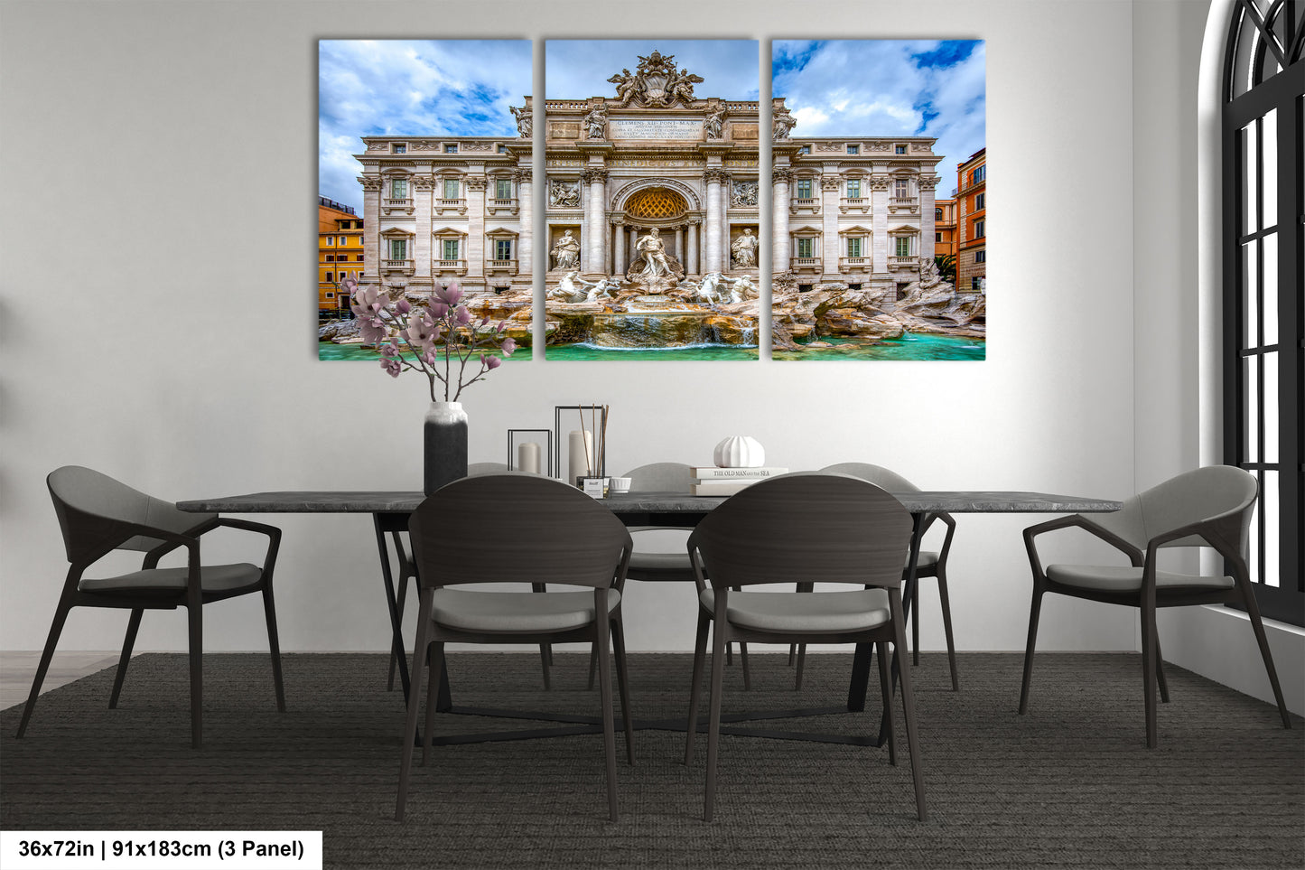 a dining room with a table and chairs