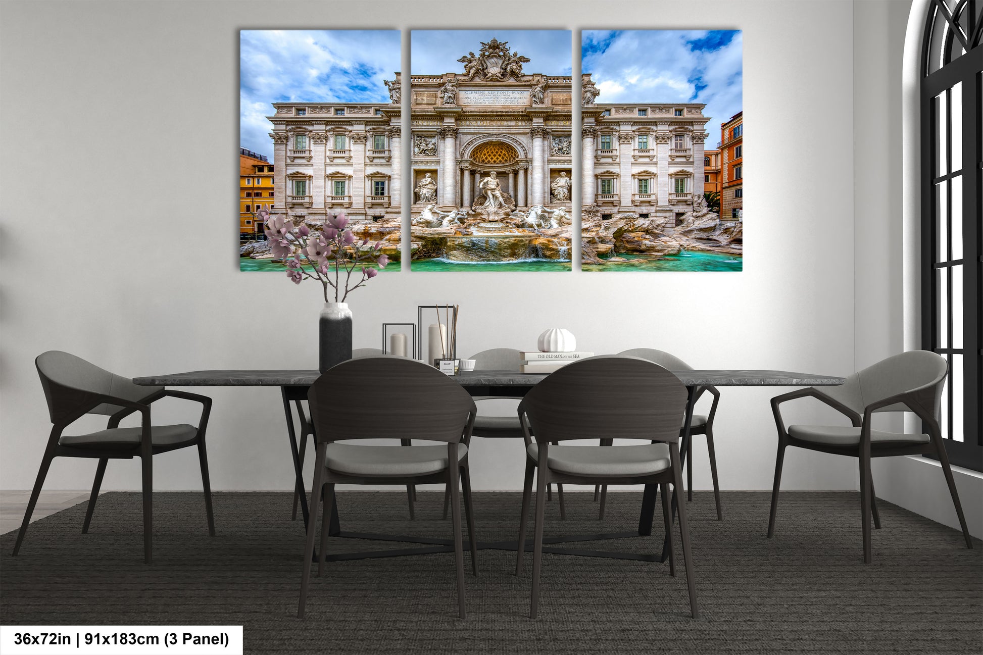 a dining room with a table and chairs