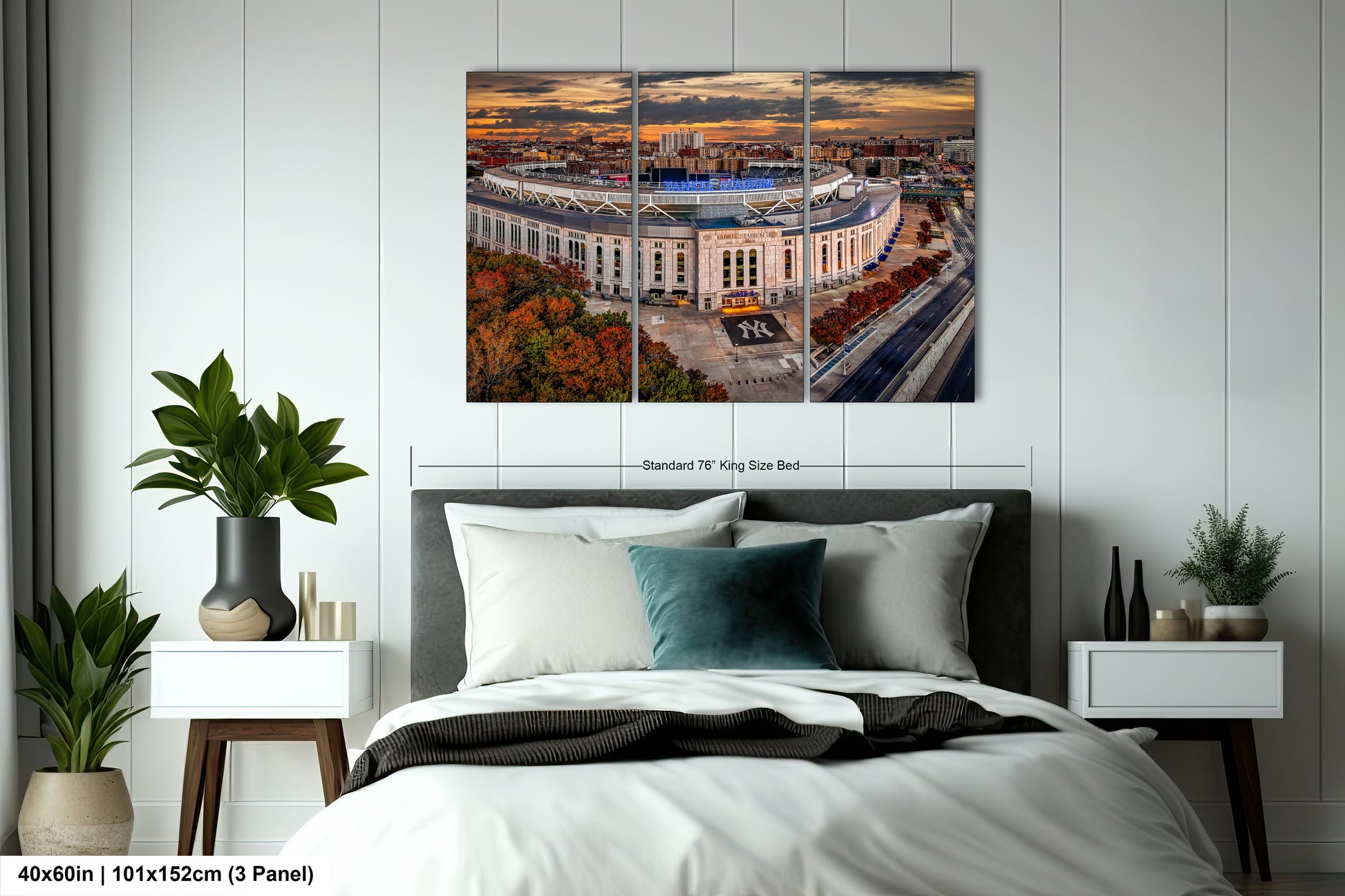 a bedroom with a large bed and a picture on the wall