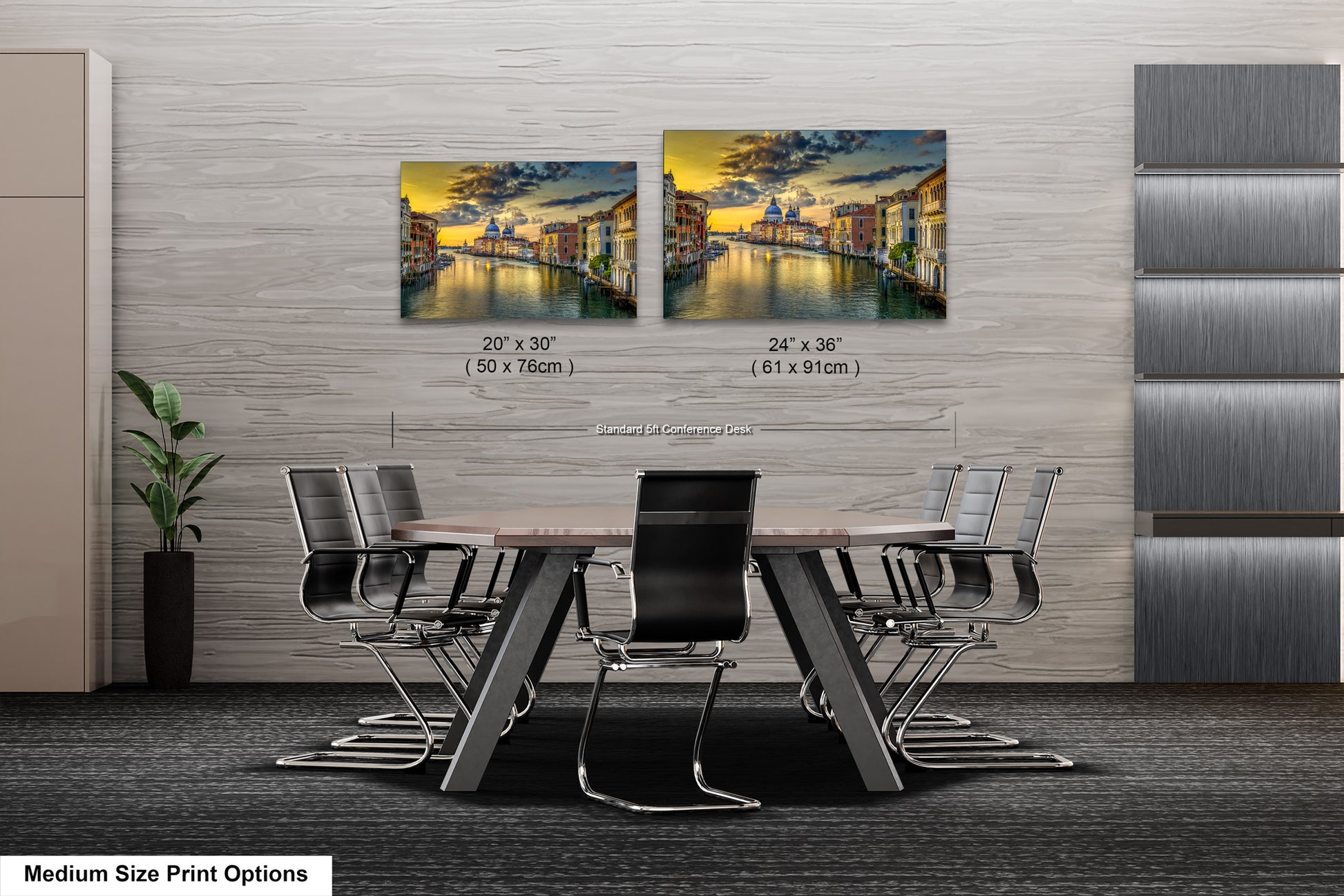 a dining room table with chairs and a painting on the wall