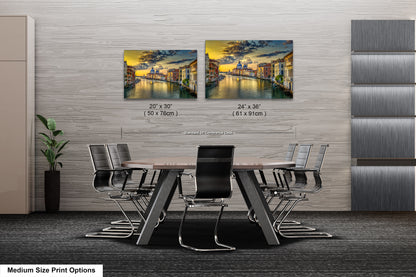 a dining room table with chairs and a painting on the wall