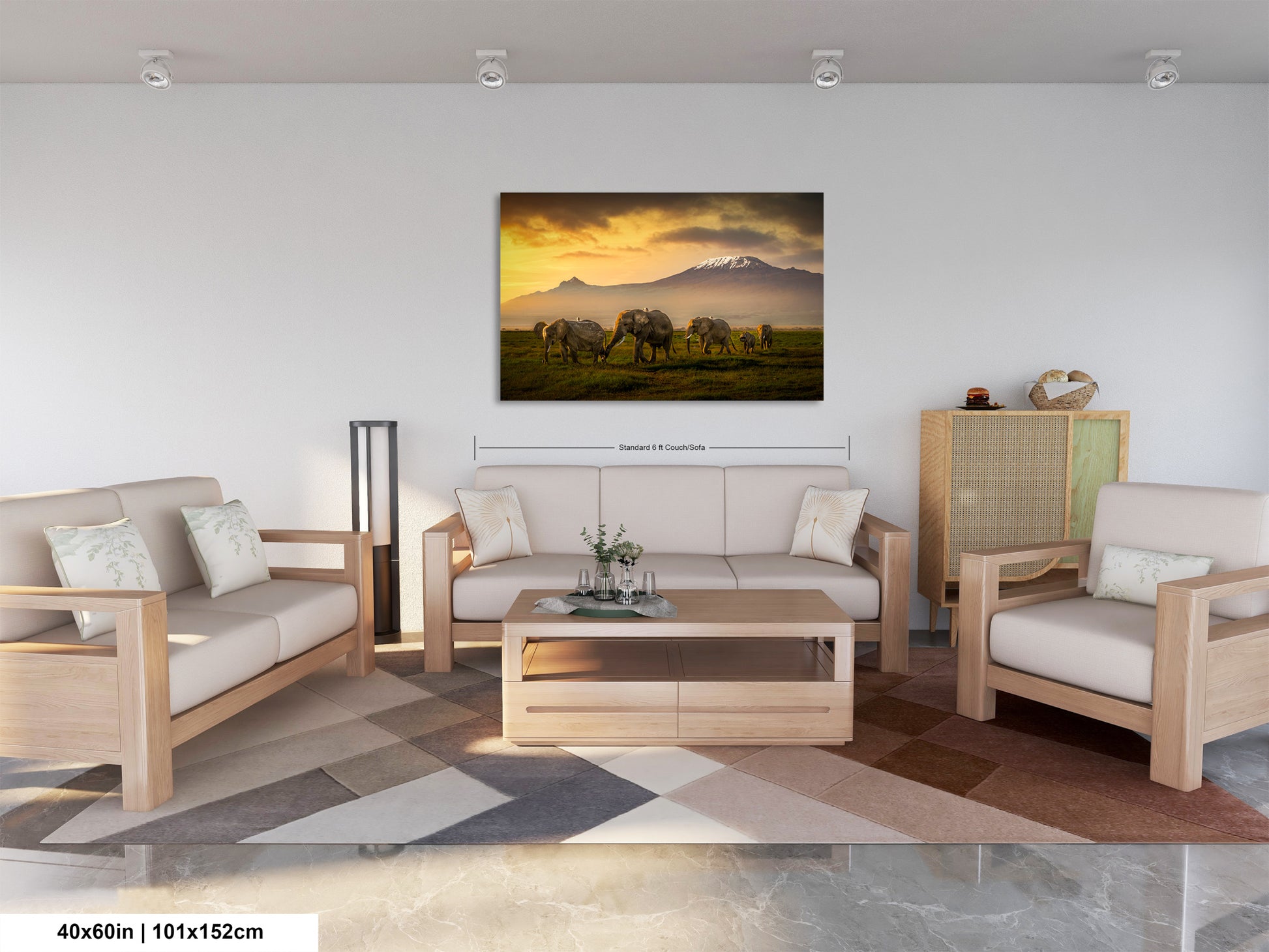 a living room filled with furniture and a painting on the wall