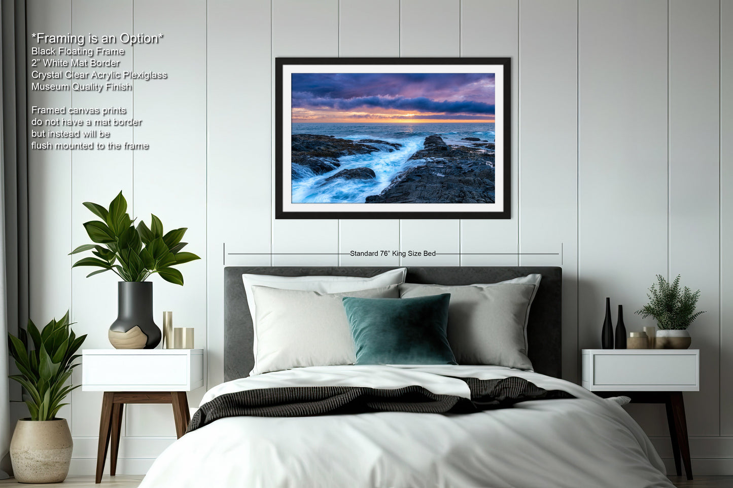 a bedroom with a bed and a picture hanging on the wall