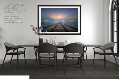 a dining room with a table and chairs
