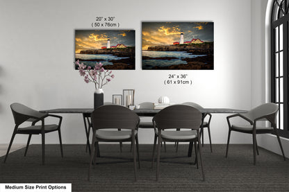 a dining room table with four chairs and a vase of flowers