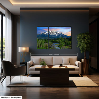 a living room filled with furniture and a painting on the wall