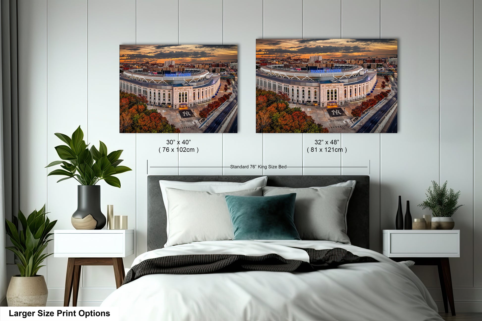 a bedroom with a large bed and two pictures on the wall