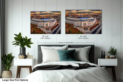 a bedroom with a large bed and two pictures on the wall