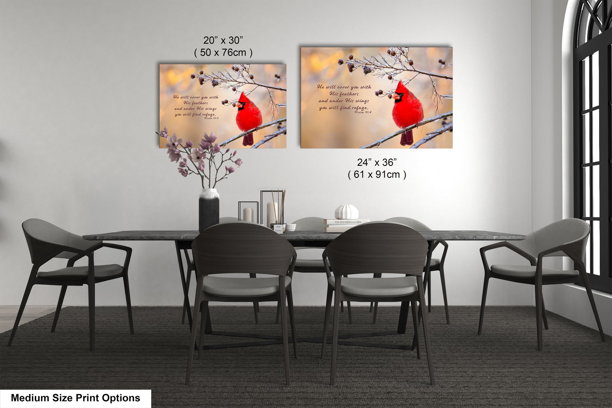 a dining room table with chairs and a vase with a cardinal on it