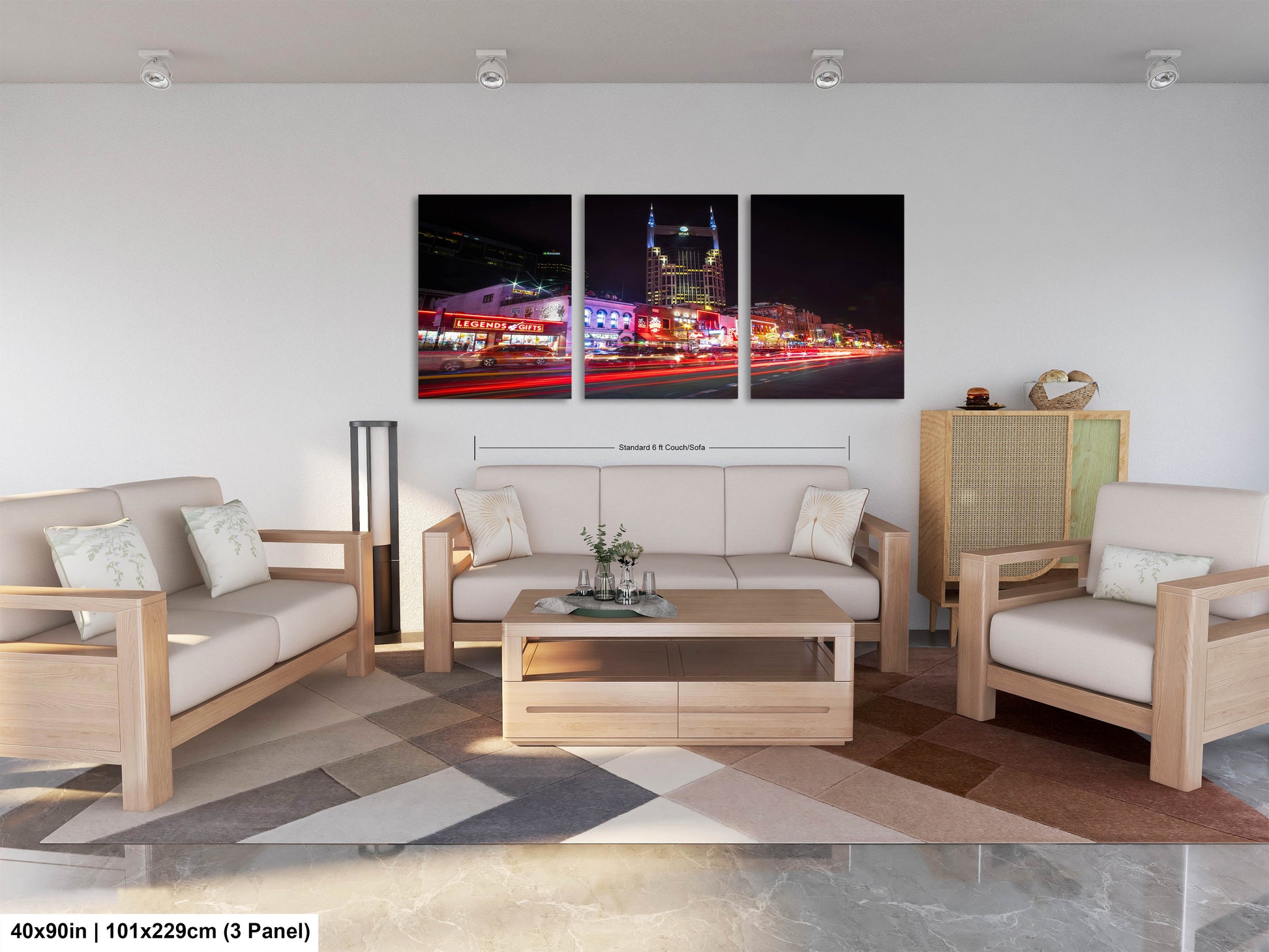 a living room filled with furniture and a painting on the wall