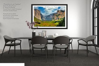 a dining room with a table and chairs