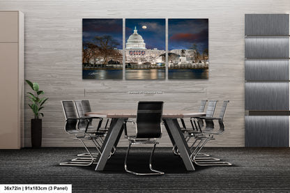 a dining room table with chairs and a picture of the capitol building
