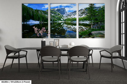 a dining room with a table and four chairs