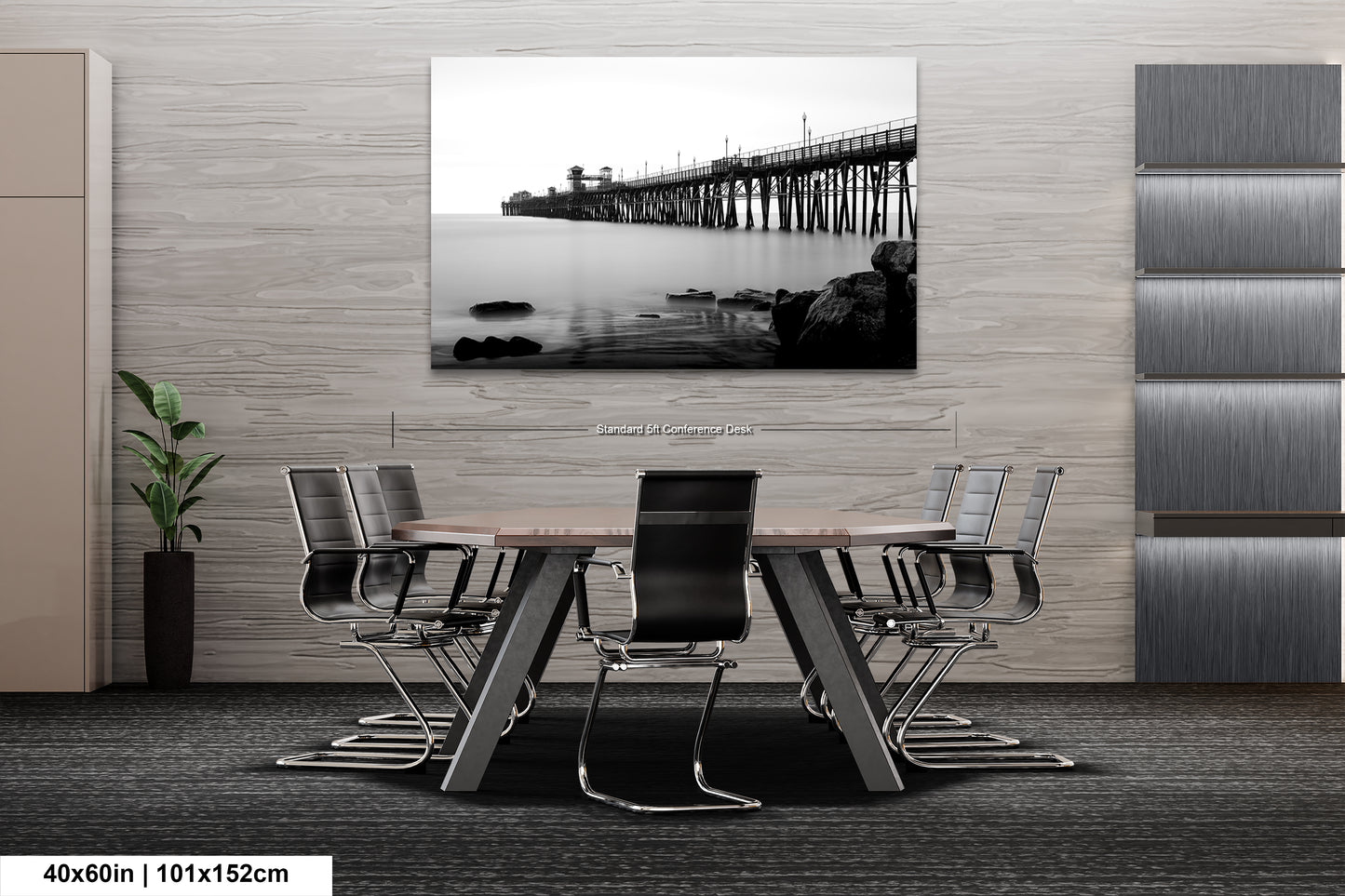 a black and white photo of a table and chairs