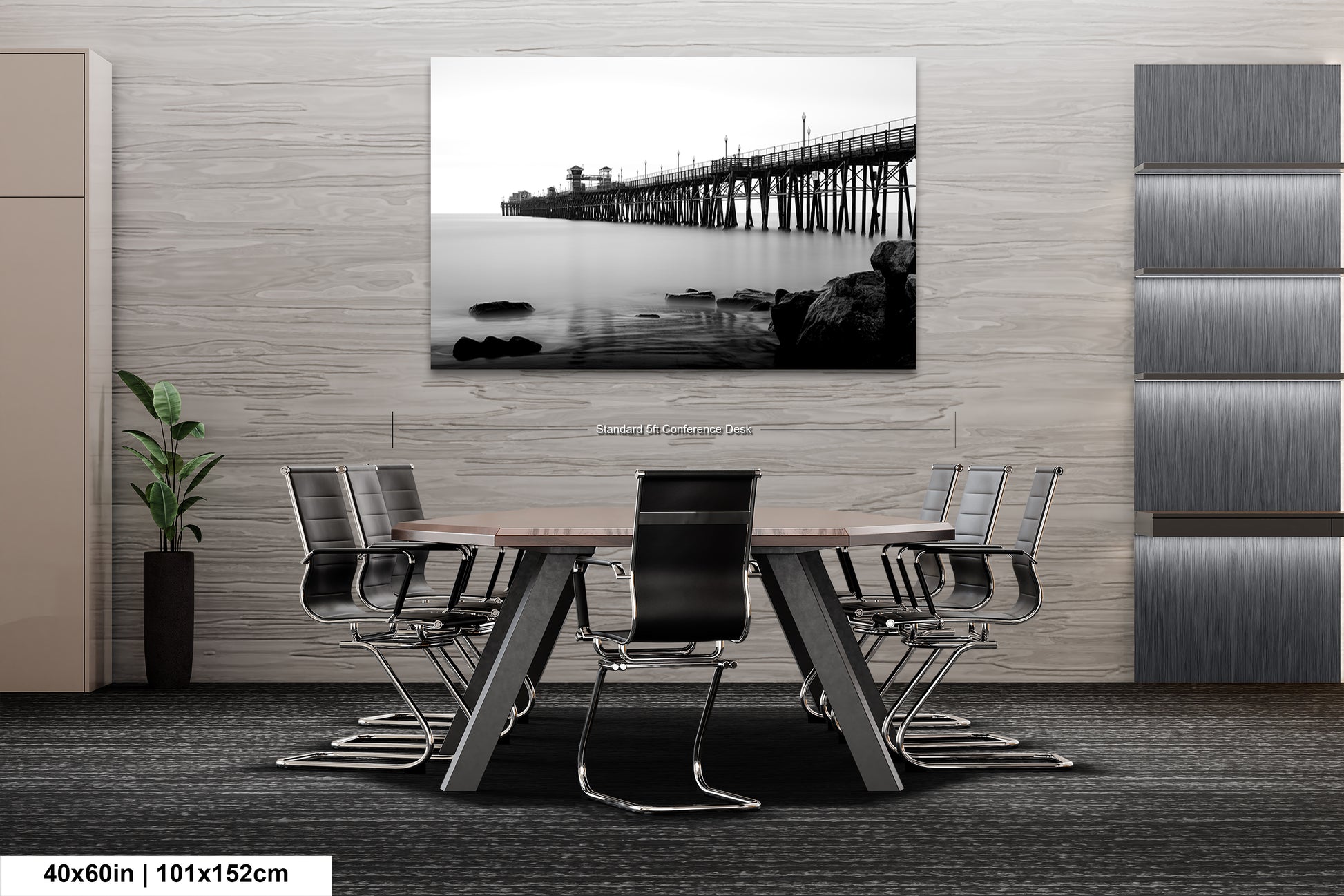a black and white photo of a table and chairs