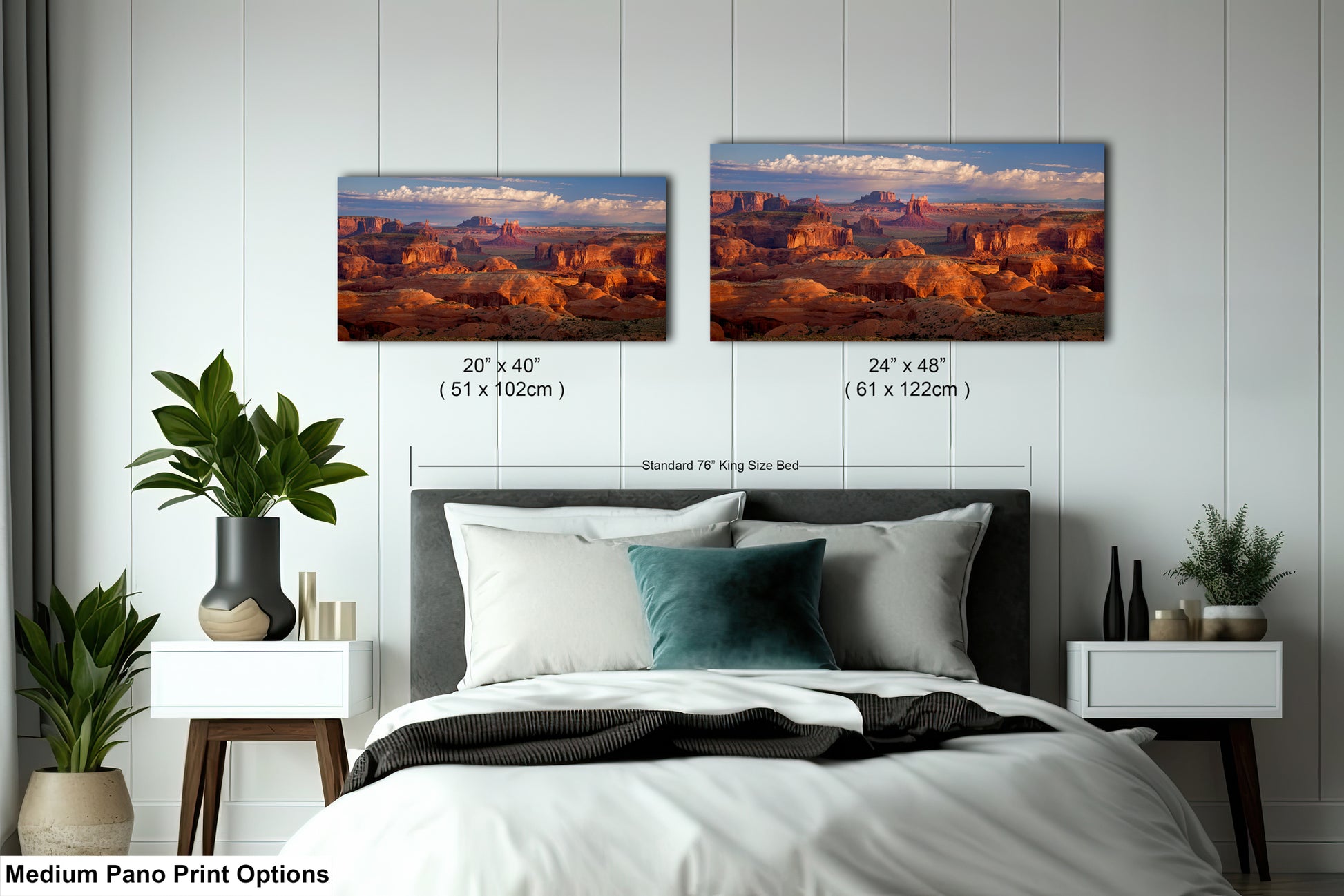 a bedroom with a bed and two pictures on the wall