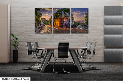 a dining room with a table and chairs