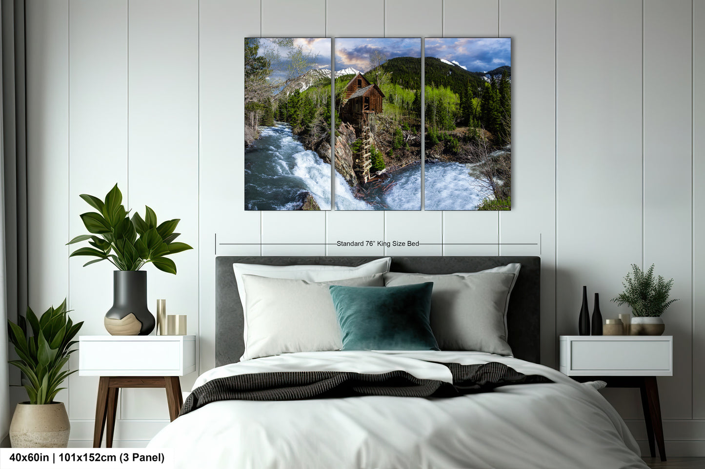 a bed room with a neatly made bed and a painting on the wall