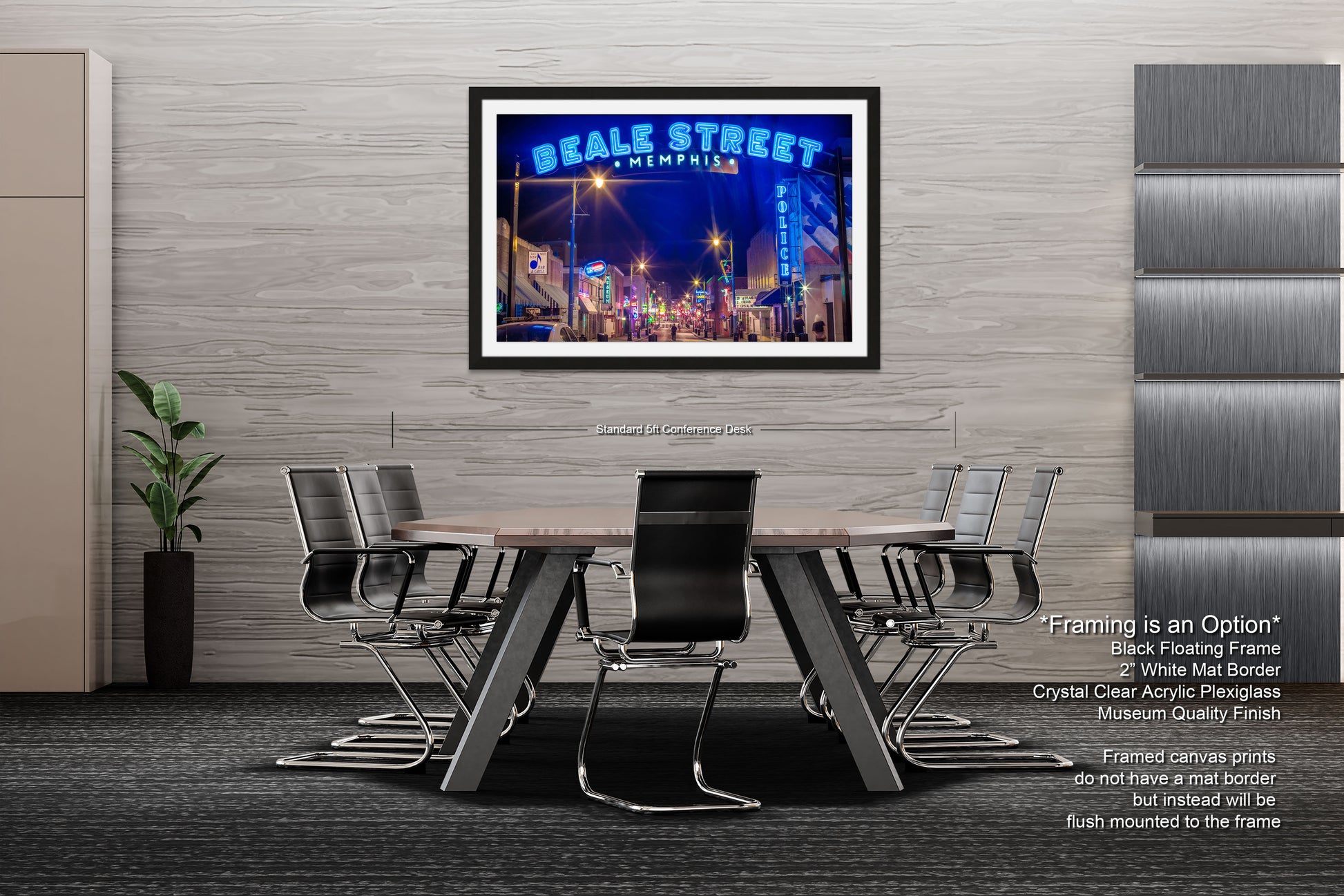 a dining room table with chairs and a poster on the wall
