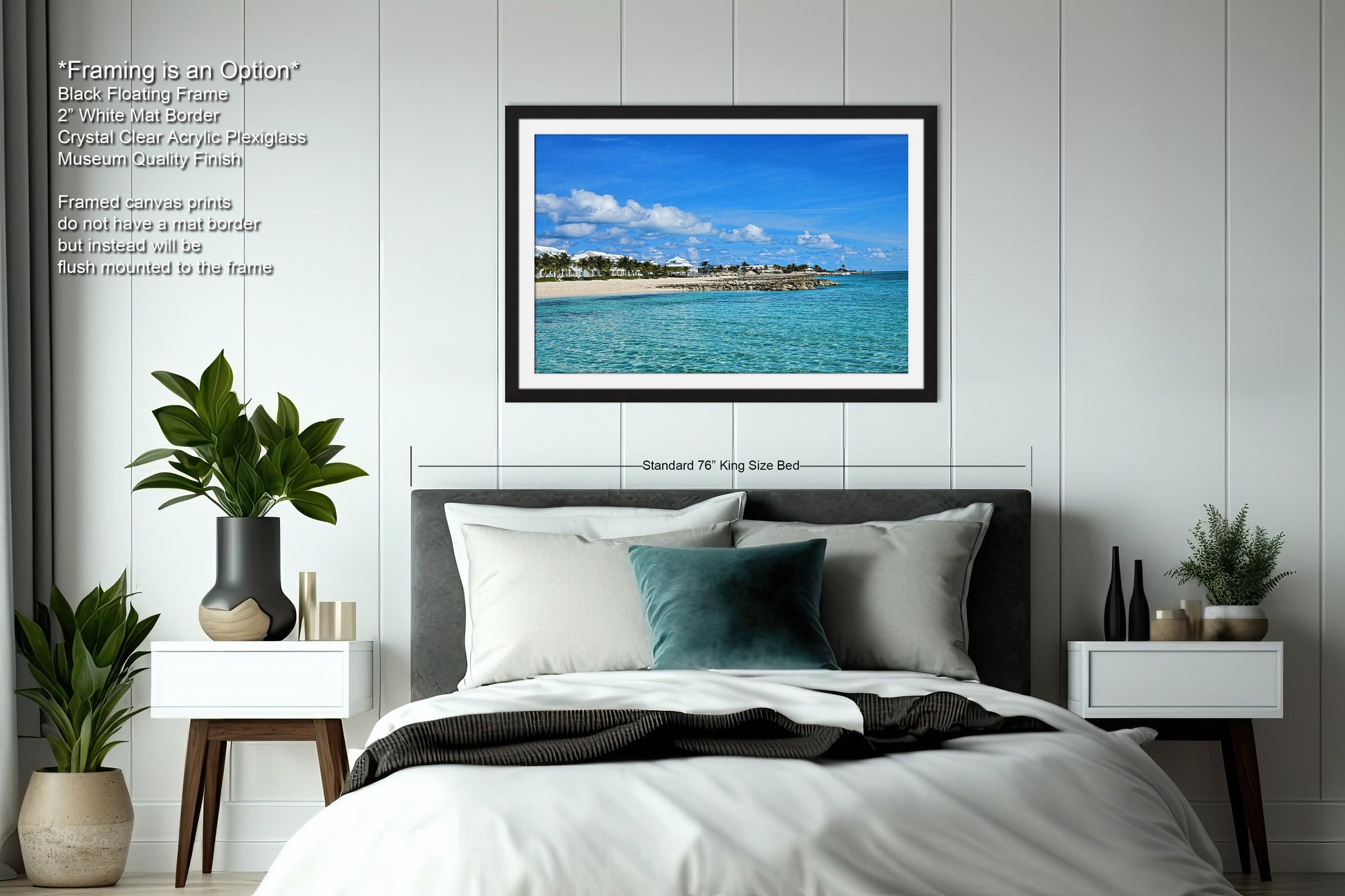 a bedroom with a bed and a picture hanging on the wall