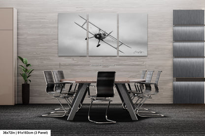 a black and white photo of a table and chairs