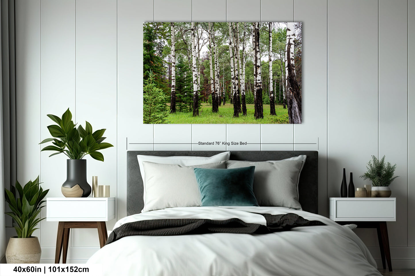 a bed in a room with a picture on the wall