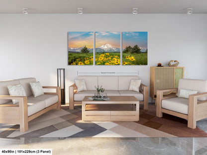 a living room filled with furniture and a painting on the wall