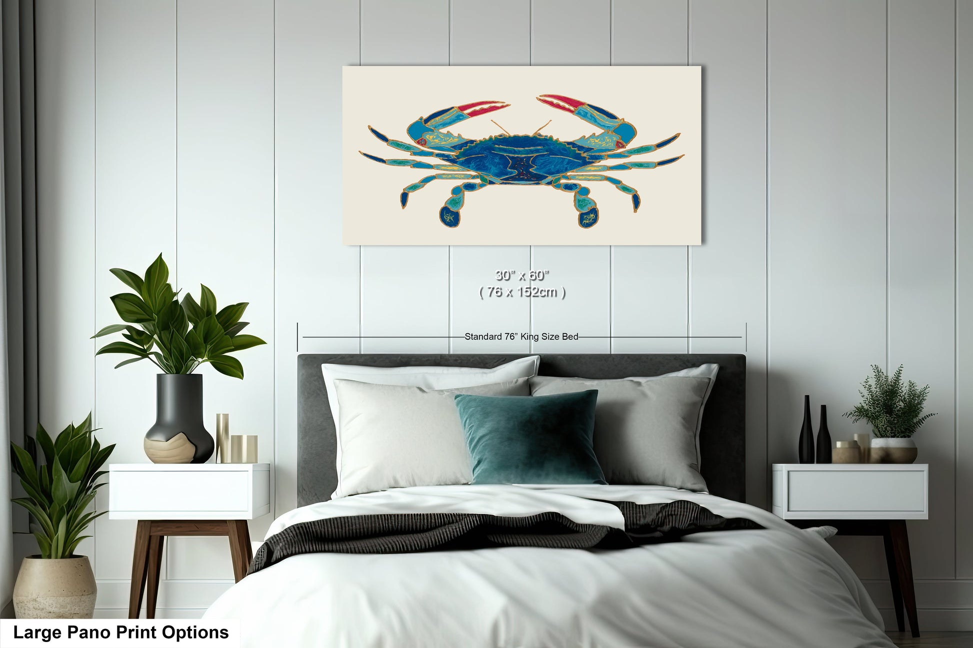 a bed with a white comforter and a blue crab on it