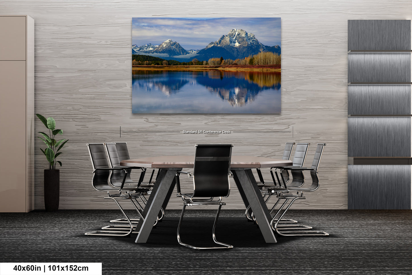 a dining room table with chairs and a painting on the wall