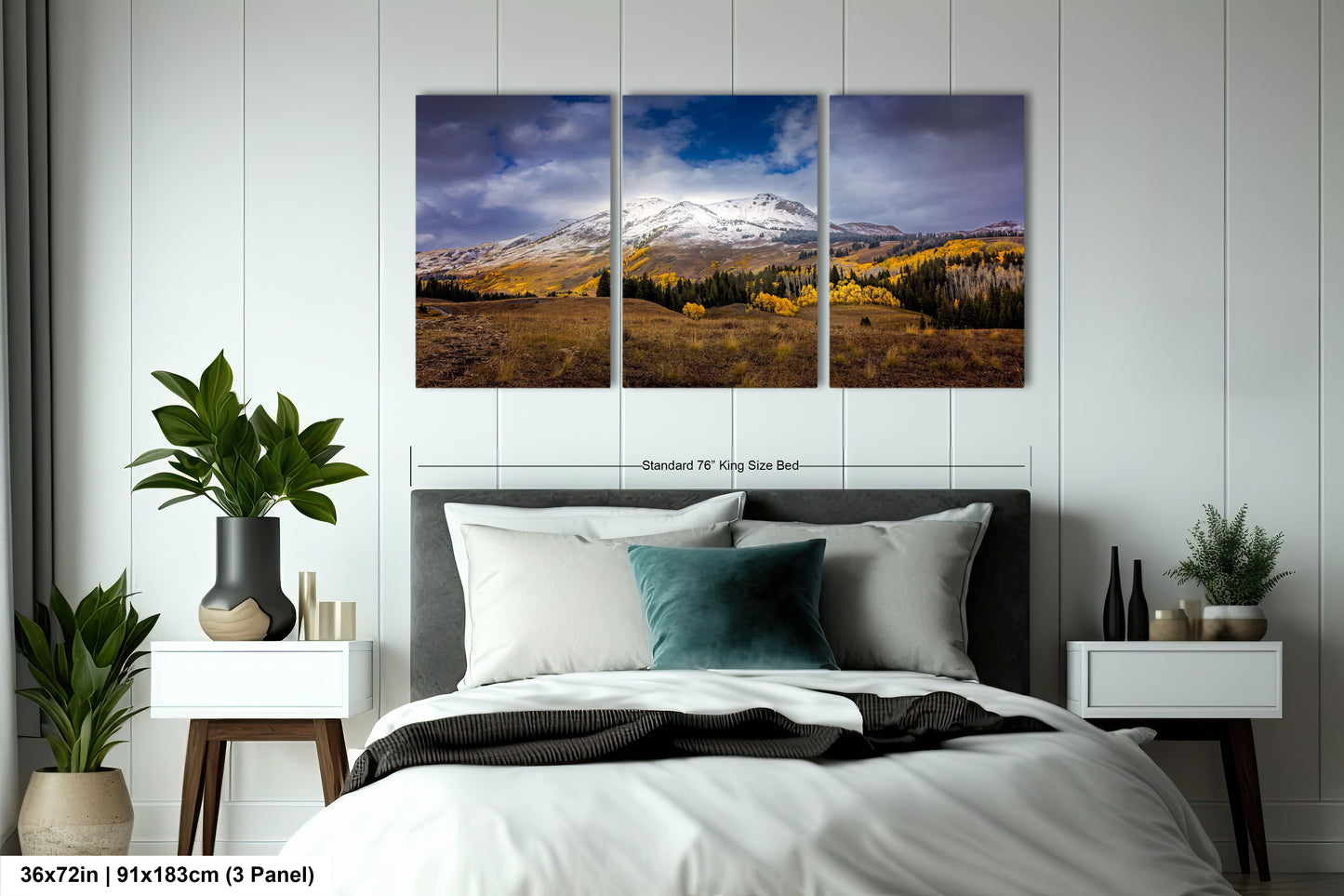a bed room with a neatly made bed and two paintings on the wall