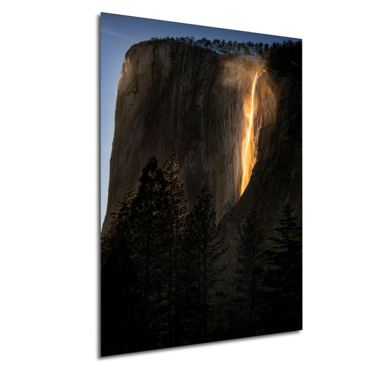 a picture of a waterfall in the mountains