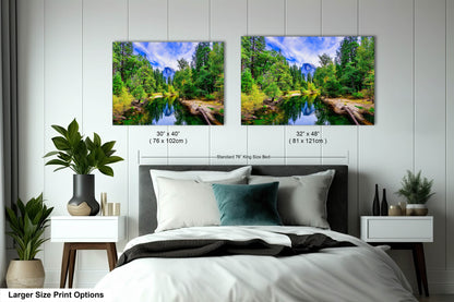 a bed room with two pictures hanging on the wall