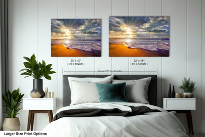 a bedroom with a bed and two pictures on the wall